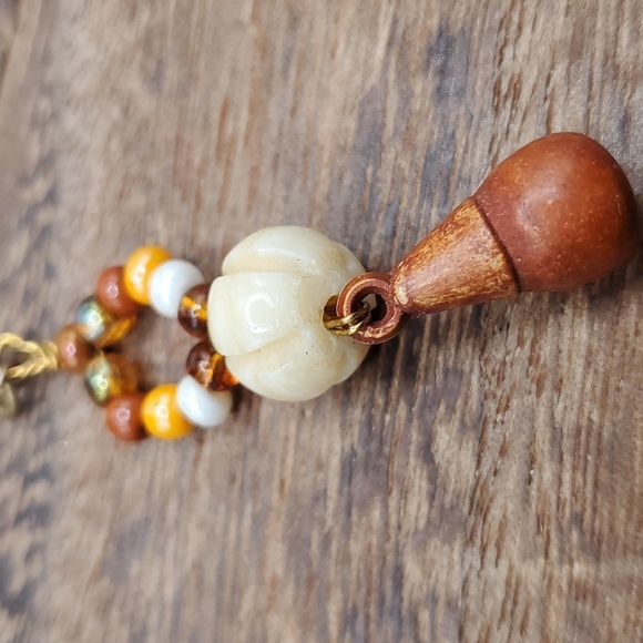 Orange medley bovine bone carved native pendant - Picture 2 of 2